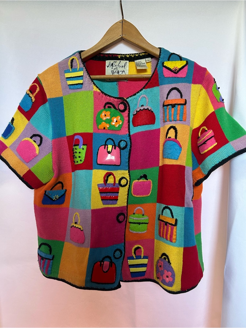 Vintage 80’s Michael Simon color- block handbag theme.